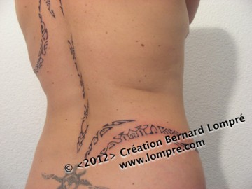Tatouage-polynesien-dos-hanche